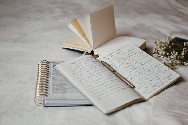 Image of a notebook with sketched diagrams and checklists